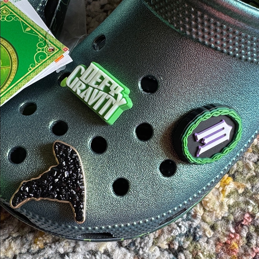 CROCS WICKED Classic Clogs with green metallic upper and themed Jibbitz charms. - Picture 4 of 8